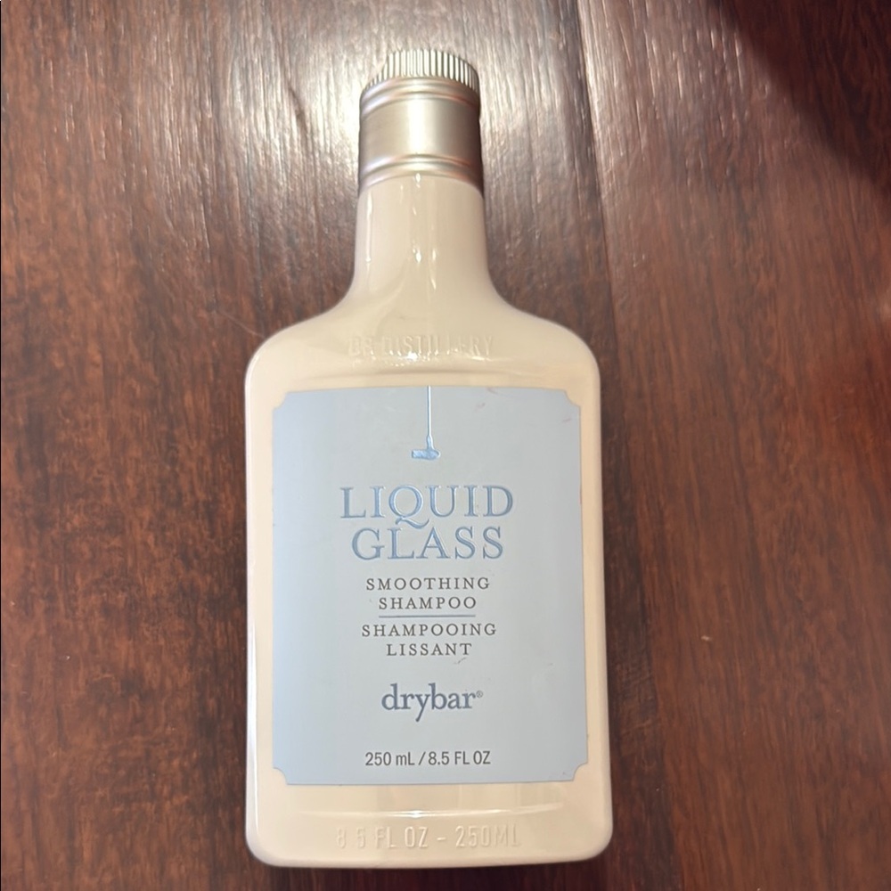 Drybar Liquid Glass Shampoo in Cream with Silver Cap